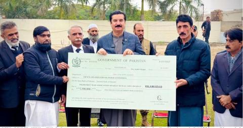 Faisal Karim Kundi hands over cheques worth Rs 4.5 Millions to Dera
