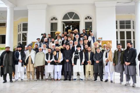 Faisal Karim Kundi calked on by a representative jirga