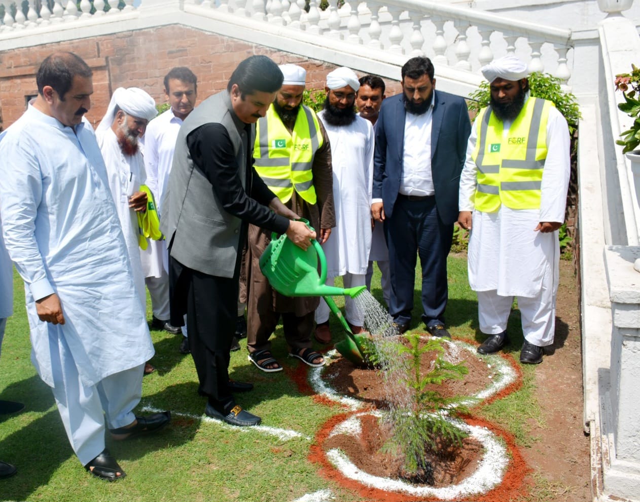 Governor Khyber Pakhtunkhwa Faisal Karim Kundi plants a sapling in the lawn of the Governor House to start plantation drive in collaboration with FGRF Dawat-e-Islami.