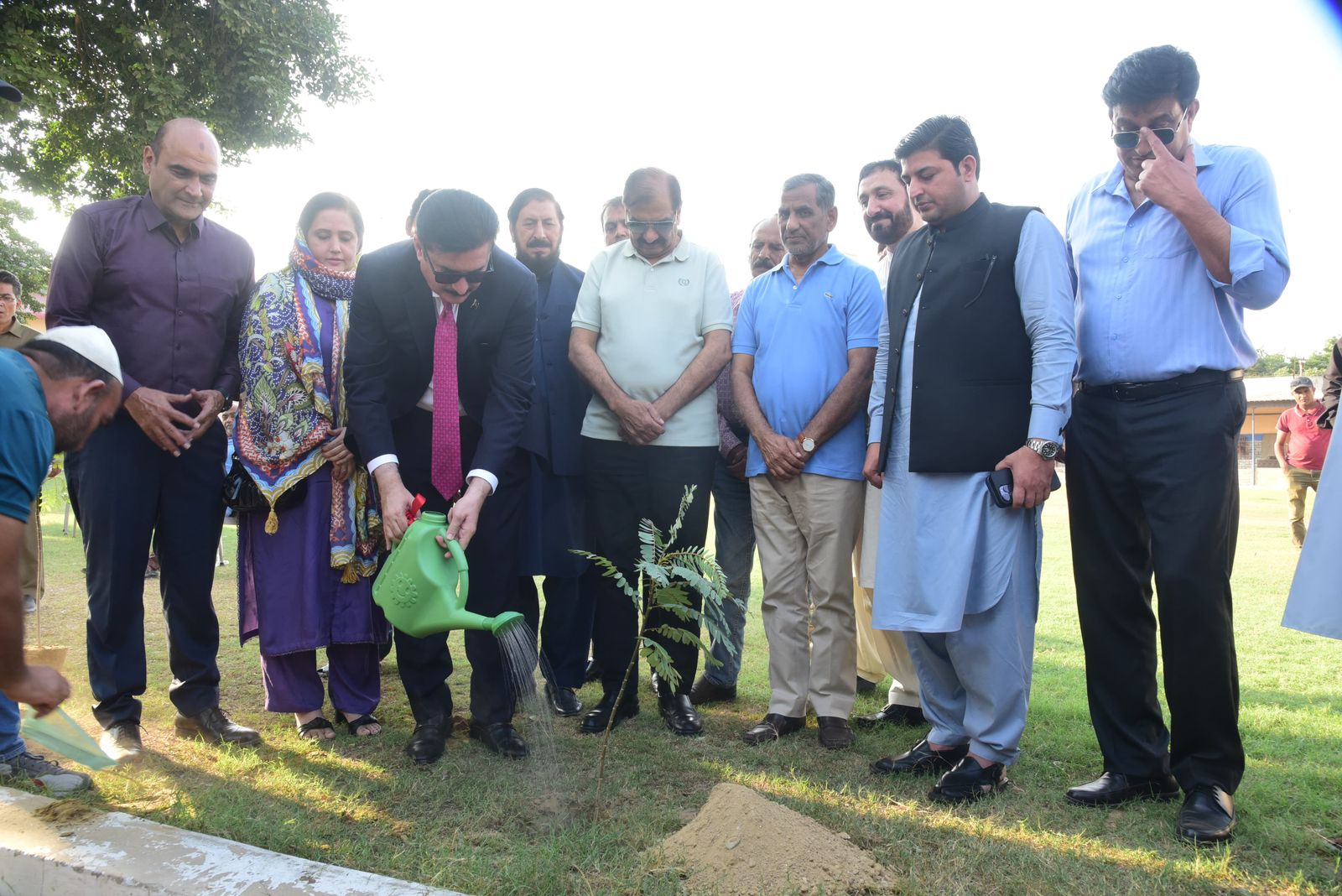 Governor Khyber Pakhtunkhwa Faisal Karim Kindi plants a sapling under POA Environment Commission Tree Plantation drive at KPT Football stadium Karachi on Thursday.