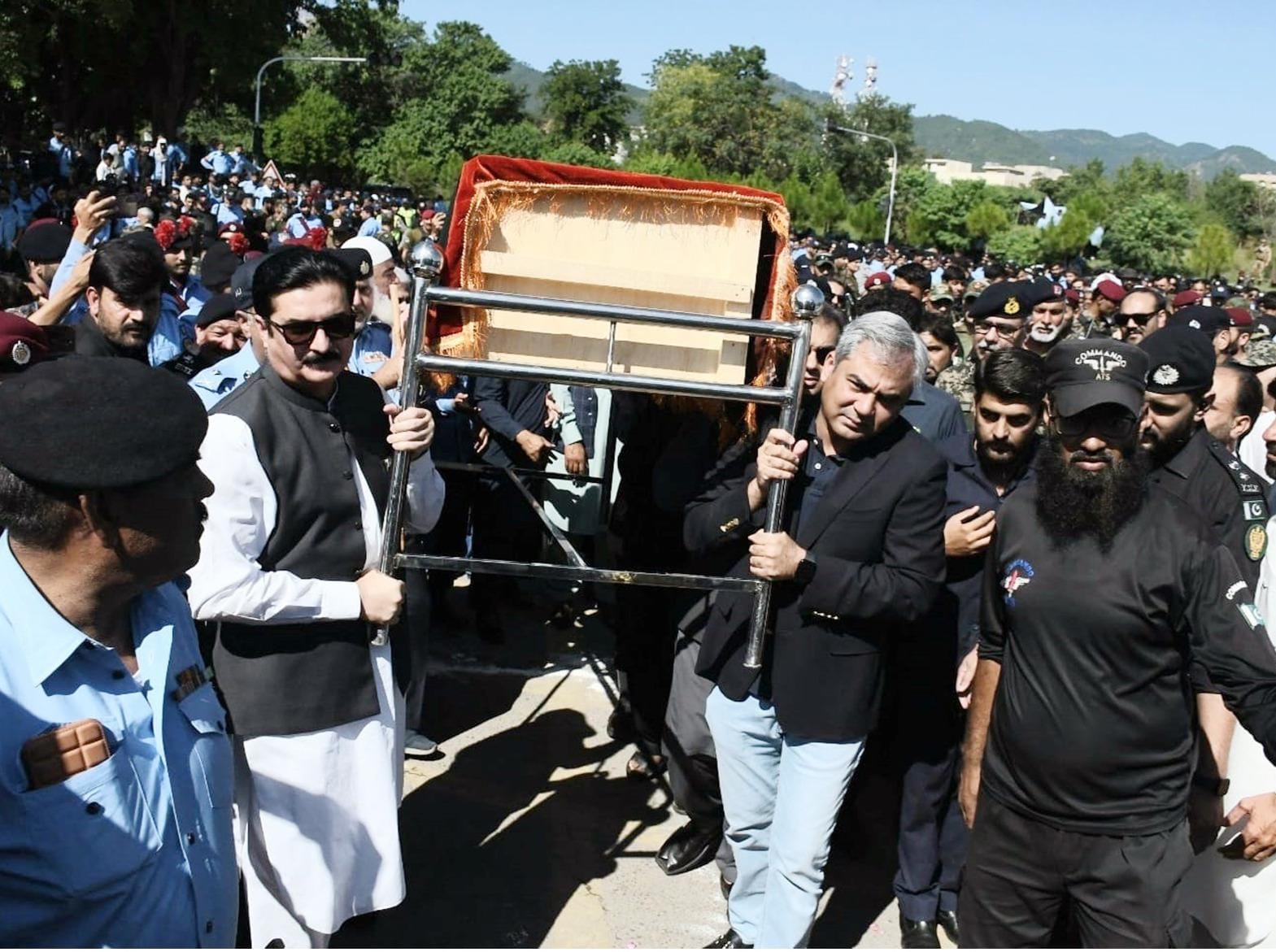 Governor Khyber Pakhtunkhwa Faisal Karim Kundi attends funeral prayer of islamabad police personnel Hameed Shah, who embraced  martyred during recent protests in Islamabad.