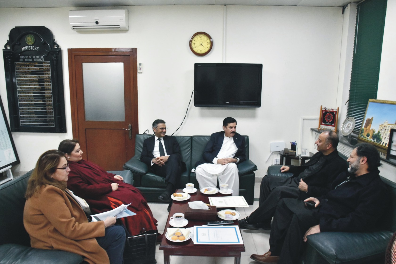 Governor Khyber Pakhtunkhwa Faisal Karim Kundi meets with Federal Minister for Petroleum Musadeq Malik at his office in Islamabad on MONDAY.