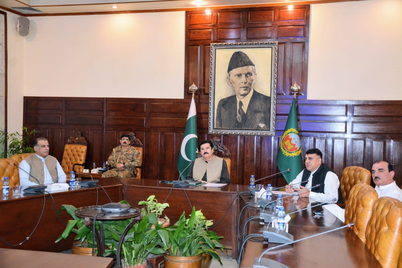 Kundi being briefed about the departmental performance of Pakistan Post Peshawar office at Governor House