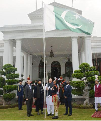 Governor Khyber Pakhtunkhwa Faisal Karim Kundi Hoisting National Flag on 77th Independence Day of Pakistan at Governor House. Consul General's of USA, Iran, and Afghanistan are also present during the official flag Hoisting ceremony.