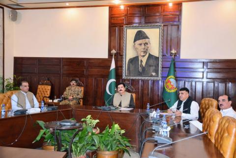 Kundi being briefed about the departmental performance of Pakistan Post Peshawar office at Governor House